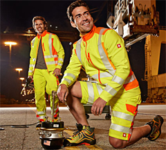 Application of reflective fabric tape on safety clothing